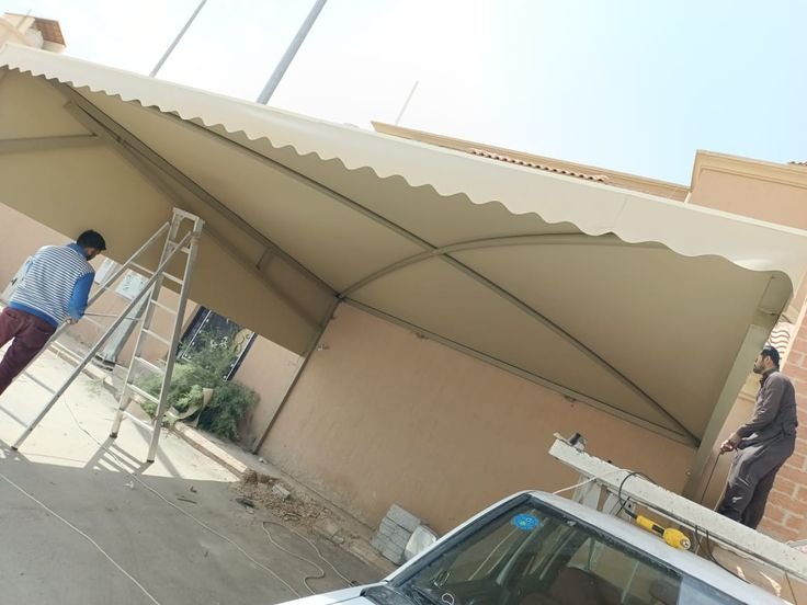 تركيب مظلات قماش كوري في حي الشوقية وحي العوالي بمكة